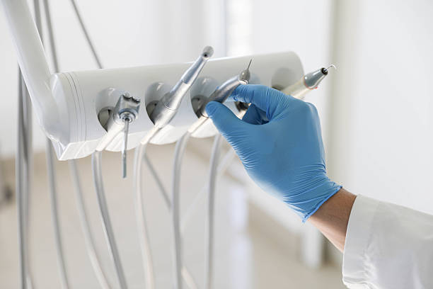 Professional Root Canal Treatment technician working in Van Buren County County, AR